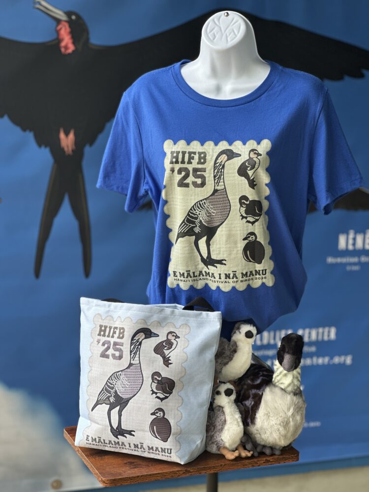 festival shirt and bag in front of the hawaii wildlife center door